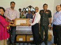 A-PAD Bangladesh staff (second from the left) handing over medicines to Mr. Palitha Wickramage of Prime Minister’s Office (third from the right)